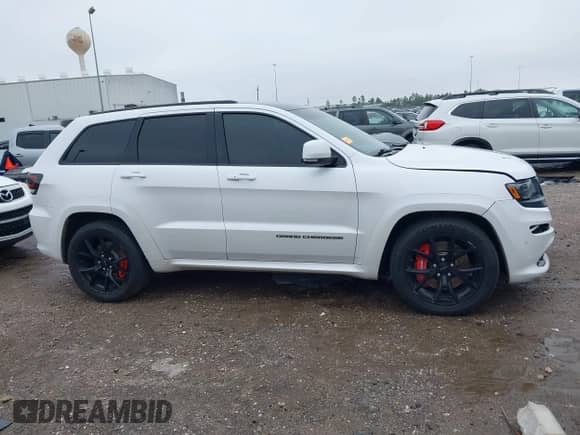 2016 Jeep Grand Cherokee SRT with VIN 1C4RJFDJ0GC456325, listed as a IAAI auction lot 41425211 with 159,746 mi miles and . Bid and sale history available at DreamBid. Image 13.