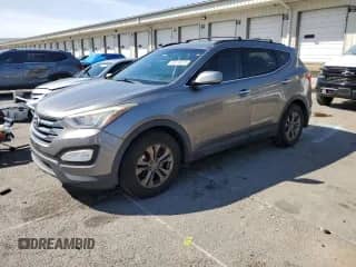 2014 Hyundai Santa Fe with VIN 5XYZU3LB2EG195823, listed as a Copart auction lot 82414075 with 202,510 mi miles and Clean title. Bid and sale history available at DreamBid. Image 1.