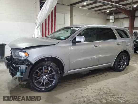2016 Dodge Durango R/T with VIN 1C4SDJCT5GC341265, listed as a Copart auction lot 82257175 with 105,859 mi miles and Salvage title. Bid and sale history available at DreamBid. Image 1.