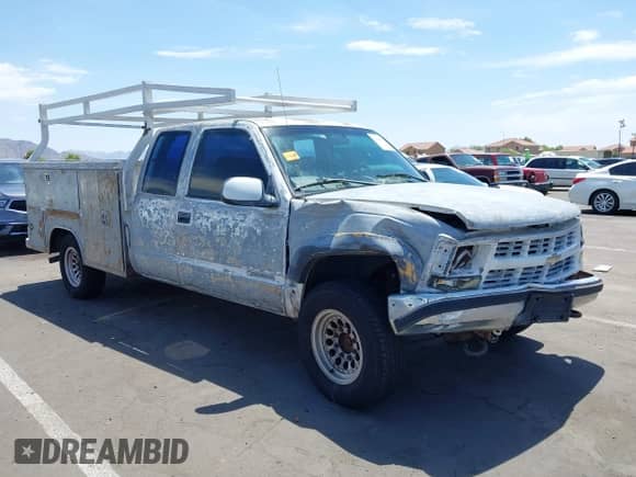 1999 Chevrolet Silverado 2500 with VIN 1GCGK29R0XF085788, listed as a IAAI auction lot 42649178 with 234,932 mi miles and . Bid and sale history available at DreamBid. Image 1.