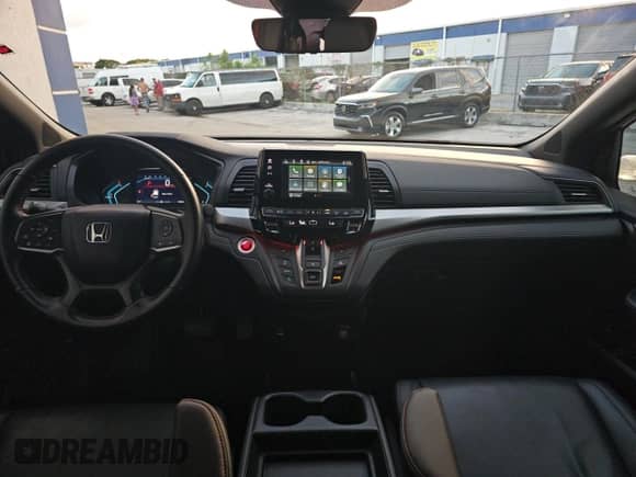 2023 Honda Odyssey Sport z VIN 5FNRL6H77PB034404, wystawiony jako Copart lot #87477395 z przebiegiem 32 135 mil mil oraz Czysty tytuł • Clean title. Historia ofert i sprzedaży dostępna na DreamBid. Obrazek 9.