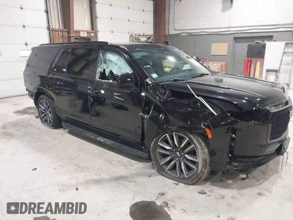 2023 Cadillac Escalade ESV 4WD Sport Platinum with VIN 1GYS4RKL1PR156900, listed as a IAAI auction lot 41740946 with 99,999 mi miles and . Bid and sale history available at DreamBid. Image 1.