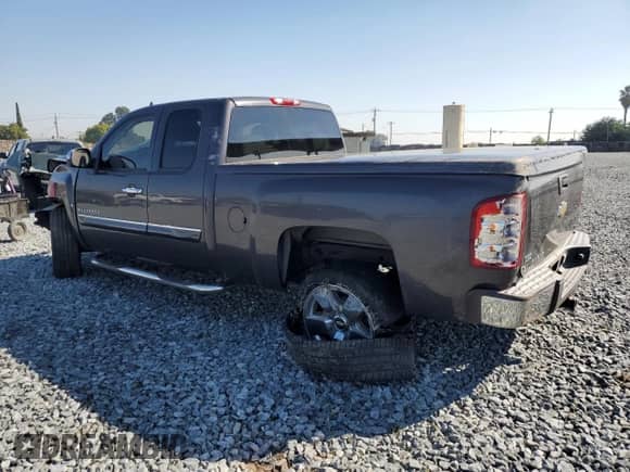 2011 Chevrolet Silverado 1500 LT with VIN 1GCRCSE00BZ145282, listed as a Copart auction lot 87397805 with 179,752 mi miles and Salvage title. Bid and sale history available at DreamBid. Image 2.