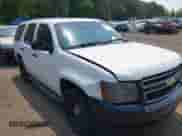 2014 Chevrolet Tahoe Commercial with VIN 1GNLC2E07ER228838, listed as a IAAI auction lot 42410417 with 140,342 mi miles and . Bid and sale history available at DreamBid. Image 6.