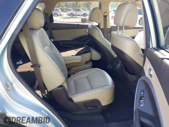 2013 Hyundai Santa Fe Limited with VIN KM8SRDHF5DU013447, listed as a IAAI auction lot 43292142 with 140,699 mi miles and . Bid and sale history available at DreamBid. Image 8.