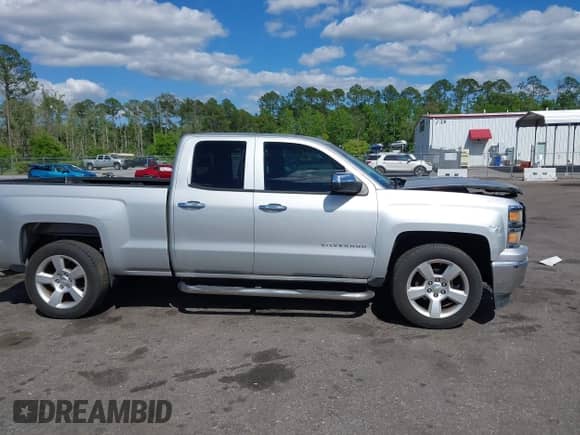 2015 Chevrolet Silverado 1500 LS with VIN 1GCRCPEH5FZ425997, listed as a IAAI auction lot 41994916 with 67,696 mi miles and . Bid and sale history available at DreamBid. Image 13.
