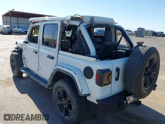 2022 Jeep Wrangler Unlimited Sahara with VIN 1C4HJXEN0NW163393, listed as a IAAI auction lot 42348484 with Not provided miles and . Bid and sale history available at DreamBid. Image 6.