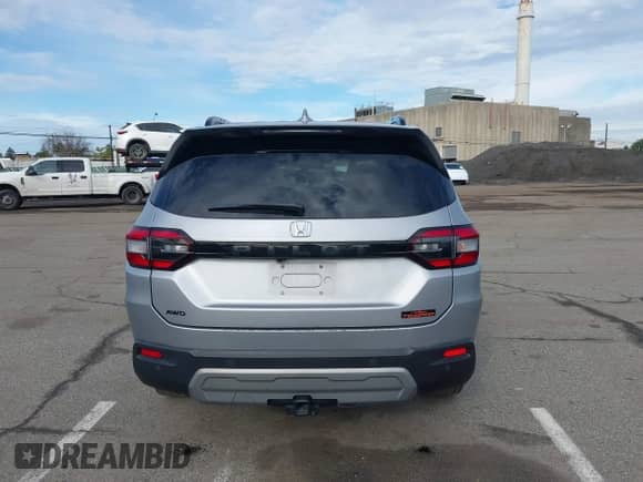 2023 Honda Pilot TrailSport z VIN 5FNYG1H6XPB050977, wystawiony jako IAAI lot #43457156 z przebiegiem 139 595 mil mil oraz . Historia ofert i sprzedaży dostępna na DreamBid. Obrazek 16.