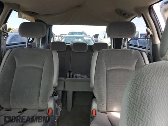 2005 Dodge Caravan SXT с VIN 2D4GP44L05R438748, выставлен на аукционе Copart как лот 74172024 с пробегом 79 944 миль миль и Списание • Salvage title. История ставок и продаж доступна на DreamBid. Изображение 10.