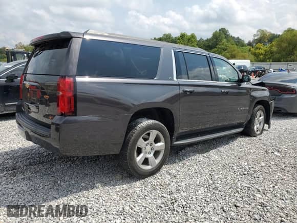 2017 Chevrolet Suburban LT с VIN 1GNSKHKC7HR286971, выставлен на аукционе Copart как лот 71402155 с пробегом 97 053 миль миль и Списание • Salvage title. История ставок и продаж доступна на DreamBid. Изображение 3.