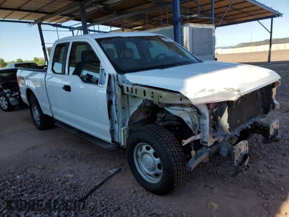 2019 Ford F-150 XL with VIN 1FTFX1E50KKE16508, listed as a Copart auction lot 83863085 with 128,011 mi miles and Salvage title. Bid and sale history available at DreamBid. Image 4.