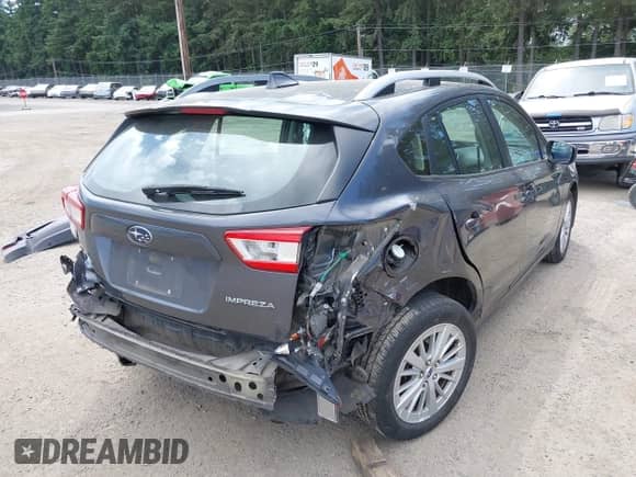 2018 Subaru Impreza Premium with VIN 4S3GTAD6XJ3724319, listed as a IAAI auction lot 42468081 with 80,574 mi miles and . Bid and sale history available at DreamBid. Image 4.