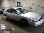 1996 Honda Accord with VIN 1HGCE664XTA019179, listed as a Copart auction lot 71292254 with 249,705 mi miles and Salvage title. Bid and sale history available at DreamBid. Image 4.