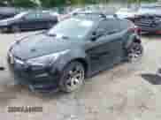2013 Hyundai Veloster w/Black Int z VIN KMHTC6AD9DU168061, wystawiony jako IAAI lot #42882210 z przebiegiem Nie podano mil oraz . Historia ofert i sprzedaży dostępna na DreamBid. Obrazek 2.