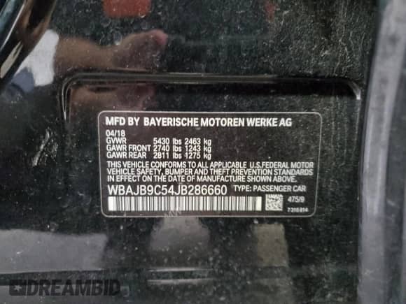 2018 BMW 5 Series M550i xDrive with VIN WBAJB9C54JB286660, listed as a Copart auction lot 62594805 with 137,794 mi miles and Salvage title. Bid and sale history available at DreamBid. Image 12.