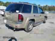 2006 Chevrolet TrailBlazer LT z VIN 1GNDS13SX62202394, wystawiony jako IAAI lot #43436574 z przebiegiem 162 902 mil mil oraz . Historia ofert i sprzedaży dostępna na DreamBid. Obrazek 4.