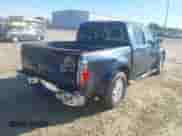 2014 Nissan Frontier Desert Runner z VIN 1N6AD0ER9EN745515, wystawiony jako IAAI lot #42321118 z przebiegiem 116 950 mil mil oraz . Historia ofert i sprzedaży dostępna na DreamBid. Obrazek 6.