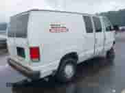 2000 Ford Econoline Cargo with VIN 1FTRE14W8YHB56751, listed as a IAAI auction lot 43197119 with 302,327 mi miles and . Bid and sale history available at DreamBid. Image 4.