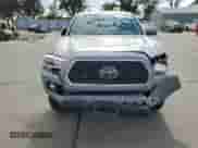 2019 Toyota Tacoma TRD Off Road z VIN 3TMCZ5AN7KM210332, wystawiony jako Copart lot #81743135 z przebiegiem 90 681 mil mil oraz Szkoda całkowita • Salvage title. Historia ofert i sprzedaży dostępna na DreamBid. Obrazek 5.