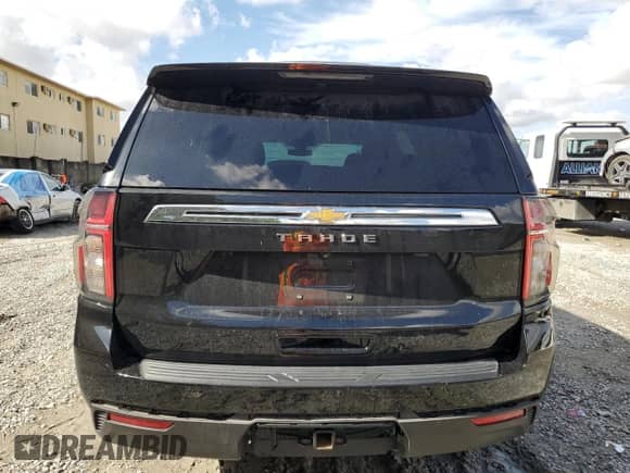 2021 Chevrolet Tahoe LS с VIN 1GNSCMKDXMR311046, выставлен на аукционе Copart как лот 85338194 с пробегом 71 634 миль миль и Списание • Salvage title. История ставок и продаж доступна на DreamBid. Изображение 6.