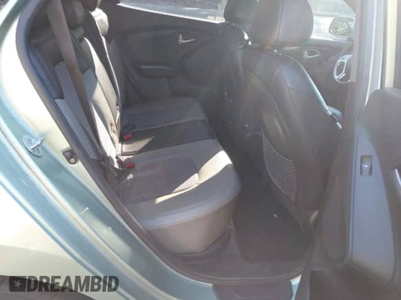 2013 Hyundai Tucson Limited z VIN KM8JUCAC2DU582647, wystawiony jako IAAI lot #43422083 z przebiegiem 145 178 mil mil oraz . Historia ofert i sprzedaży dostępna na DreamBid. Obrazek 8.