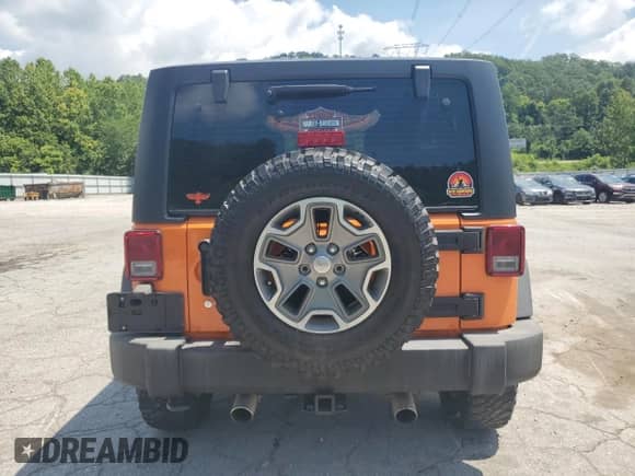 2013 Jeep Wrangler Rubicon 10th Anniversary with VIN 1C4BJWCG0DL526182, listed as a Copart auction lot 64806935 with 25,007 mi miles and Clean title. Bid and sale history available at DreamBid. Image 6.