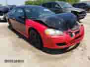 2004 Dodge Stratus SXT with VIN 4B3AG42G74E092556, listed as a Copart auction lot 56297744 with 187,288 mi miles and Salvage title. Bid and sale history available at DreamBid. Image 4.