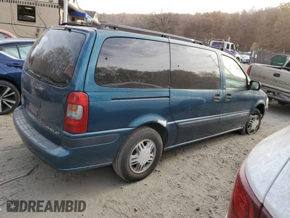 2004 Chevrolet Venture LS z VIN 1GNDX03E24D154722, wystawiony jako Copart lot #78834974 z przebiegiem 217 087 mil mil oraz Szkoda całkowita • Salvage title. Historia ofert i sprzedaży dostępna na DreamBid. Obrazek 3.