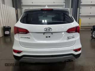 2018 Hyundai Santa Fe 2.0T z VIN 5XYZUDLA5JG512405, wystawiony jako Copart lot #80729765 z przebiegiem 119 825 mil mil oraz Szkoda całkowita • Salvage title. Historia ofert i sprzedaży dostępna na DreamBid. Obrazek 6.