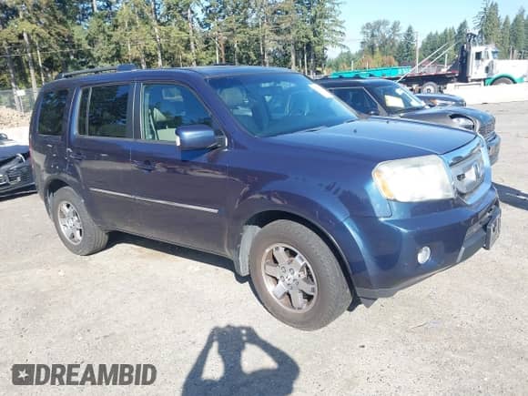 2009 Honda Pilot Touring with VIN 5FNYF489X9B007452, listed as a IAAI auction lot 43262557 with 206,355 mi miles and . Bid and sale history available at DreamBid. Image 1.