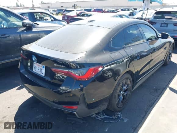 2023 BMW i4 eDrive35 с VIN WBY43AW0XPFP87471, выставлен на аукционе IAAI как лот 43165220 с пробегом 26 727 миль миль и . История ставок и продаж доступна на DreamBid. Изображение 4.