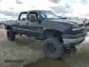 2003 Chevrolet Silverado 2500HD LT with VIN 1GCHK23U03F180119, listed as a Copart auction lot 47255665 with 200,243 mi miles and Salvage title. Bid and sale history available at DreamBid. Image 4.