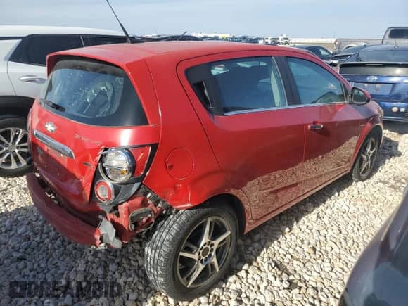 2012 Chevrolet Sonic LTZ с VIN 1G1JF6SB7C4159172, выставлен на аукционе Copart как лот 44067215 с пробегом 61 134 миль миль и Списание • Salvage title. История ставок и продаж доступна на DreamBid. Изображение 3.