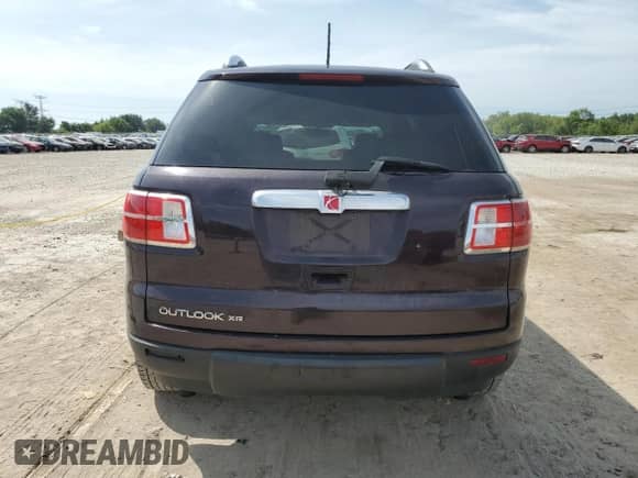 2009 Saturn Outlook XR with VIN 5GZER23D39J108317, listed as a Copart auction lot 66193775 with 243,038 mi miles and Salvage title. Bid and sale history available at DreamBid. Image 6.