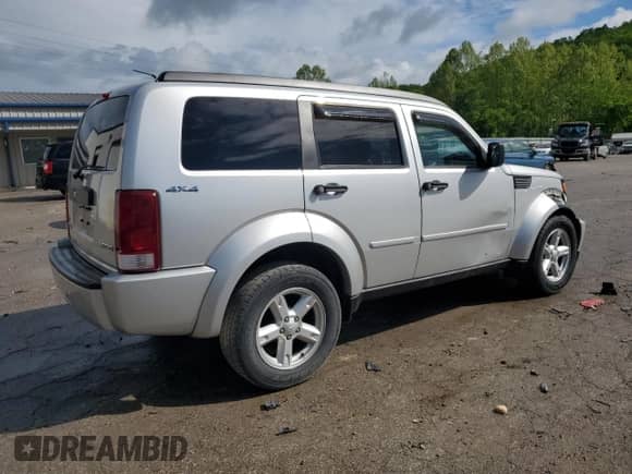 2009 Dodge Nitro SE with VIN 1D8GU28K49W541908, listed as a Copart auction lot 55815125 with 101,710 mi miles and Salvage title. Bid and sale history available at DreamBid. Image 3.