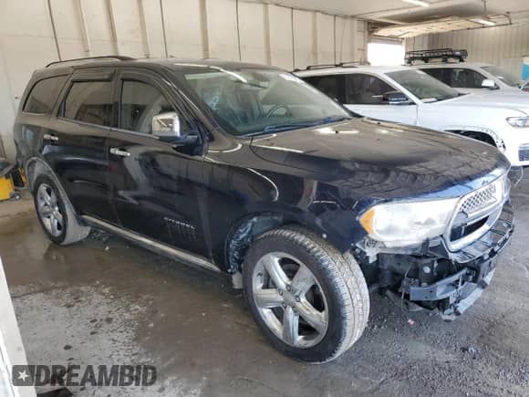 2011 Dodge Durango Citadel with VIN 1D4SD5GT7BC651365, listed as a Copart auction lot 71823405 with 173,479 mi miles and Salvage title. Bid and sale history available at DreamBid. Image 4.