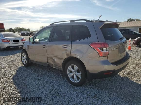 2014 Subaru Forester Touring with VIN JF2SJAPC9EH429692, listed as a Copart auction lot 84571005 with 81,228 mi miles and Salvage title. Bid and sale history available at DreamBid. Image 2.