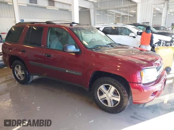 2004 Chevrolet TrailBlazer LS with VIN 1GNDT13S542446593, listed as a IAAI auction lot 41618585 with 178,284 mi miles and . Bid and sale history available at DreamBid. Image 1.