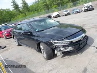2018 Honda Accord Touring с VIN 1HGCV1F90JA107010, выставлен на аукционе IAAI как лот 42350732 с пробегом 103 851 миль миль и . История ставок и продаж доступна на DreamBid. Изображение 1.