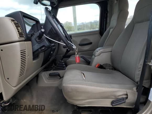 2003 Jeep Wrangler Sahara с VIN 1J4FA59S13P312830, выставлен на аукционе Copart как лот 52730955 с пробегом 99 247 миль миль и Списание • Salvage title. История ставок и продаж доступна на DreamBid. Изображение 7.