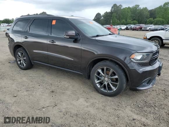 2017 Dodge Durango GT with VIN 1C4RDHDGXHC703424, listed as a Copart auction lot 54164715 with 149,961 mi miles and Salvage title. Bid and sale history available at DreamBid. Image 4.