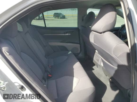 2023 Toyota Camry LE z VIN 4T1C11AK0PU152102, wystawiony jako Copart lot #71174015 z przebiegiem 56 081 mil mil oraz Szkoda całkowita • Salvage title. Historia ofert i sprzedaży dostępna na DreamBid. Obrazek 10.