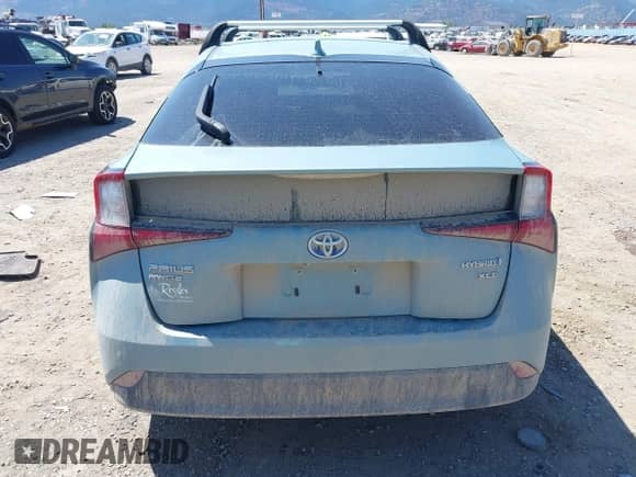 2021 Toyota Prius LE with VIN JTDL9MFU9M3023818, listed as a IAAI auction lot 42842899 with 99,876 mi miles and . Bid and sale history available at DreamBid. Image 16.