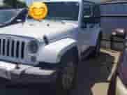 2014 Jeep Wrangler Sahara z VIN 1C4AJWBG3EL197444, wystawiony jako Copart lot #64733055 z przebiegiem 193 278 mil mil oraz Czysty tytuł • Clean title. Historia ofert i sprzedaży dostępna na DreamBid. Obrazek 2.