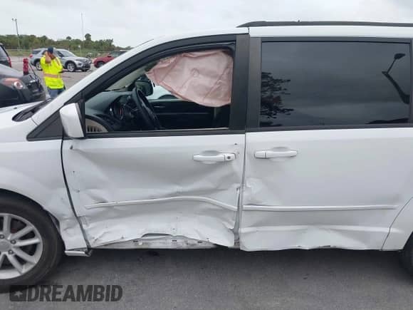2014 Dodge Grand Caravan SXT 30th Anniversary with VIN 2C4RDGCG0ER254057, listed as a IAAI auction lot 40737960 with 142,301 mi miles and . Bid and sale history available at DreamBid. Image 6.