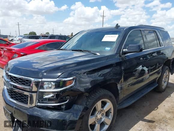 2019 Chevrolet Tahoe LT with VIN 1GNSCBKC5KR327874, listed as a IAAI auction lot 42565643 with 79,213 mi miles and . Bid and sale history available at DreamBid. Image 18.
