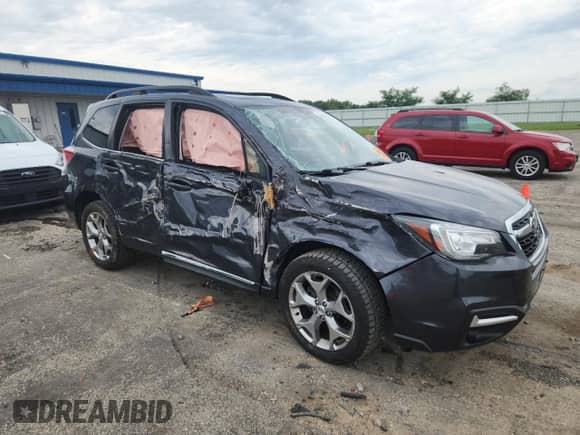 2018 Subaru Forester Touring with VIN JF2SJAWCXJH608304, listed as a Copart auction lot 64078565 with 87,289 mi miles and Non repairable. Bid and sale history available at DreamBid. Image 4.