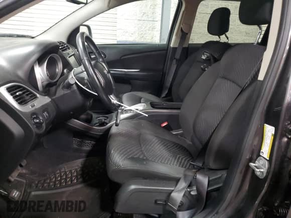 2017 Dodge Journey SXT with VIN 3C4PDDBG1HT561018, listed as a Copart auction lot 69006095 with 136,612 mi miles and Salvage title. Bid and sale history available at DreamBid. Image 7.