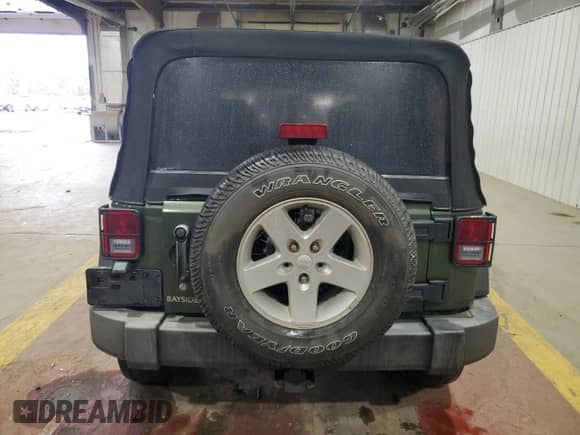 2008 Jeep Wrangler Unlimited X with VIN 1J4GA39158L583789, listed as a Copart auction lot 86292065 with 170,334 mi miles and Salvage title. Bid and sale history available at DreamBid. Image 6.