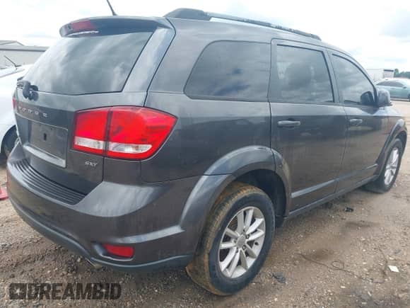 2017 Dodge Journey SXT with VIN 3C4PDDBG8HT591844, listed as a IAAI auction lot 42774893 with 198,419 mi miles and . Bid and sale history available at DreamBid. Image 4.